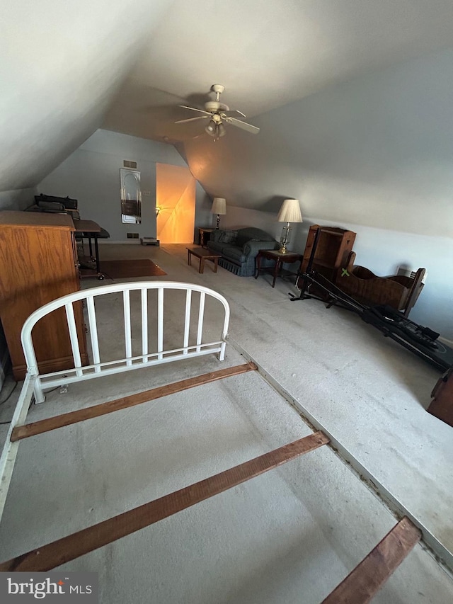 unfurnished bedroom featuring ceiling fan and vaulted ceiling