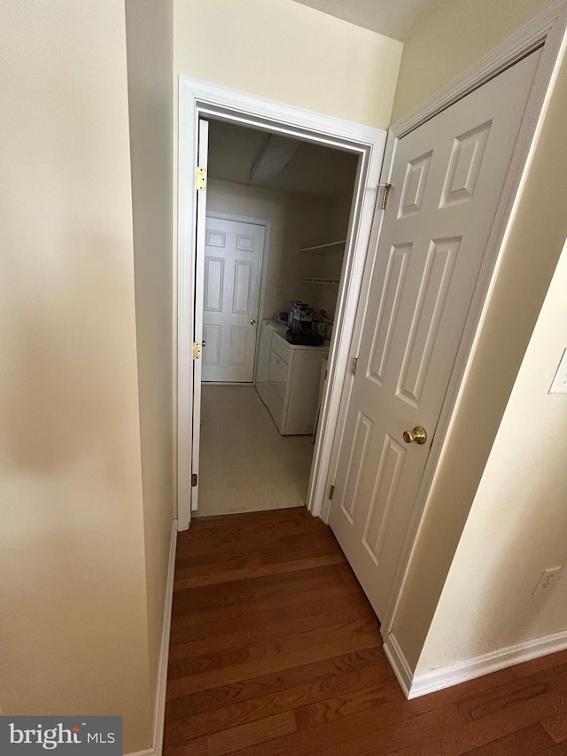 hallway with wood-type flooring