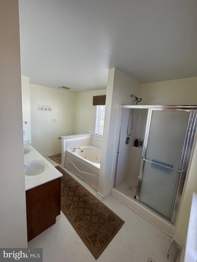 bathroom with separate shower and tub and vanity