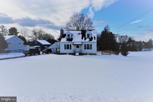 view of new england style home