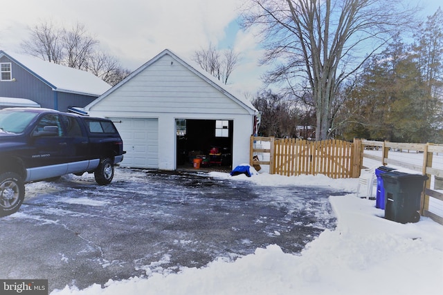 view of snow covered garage