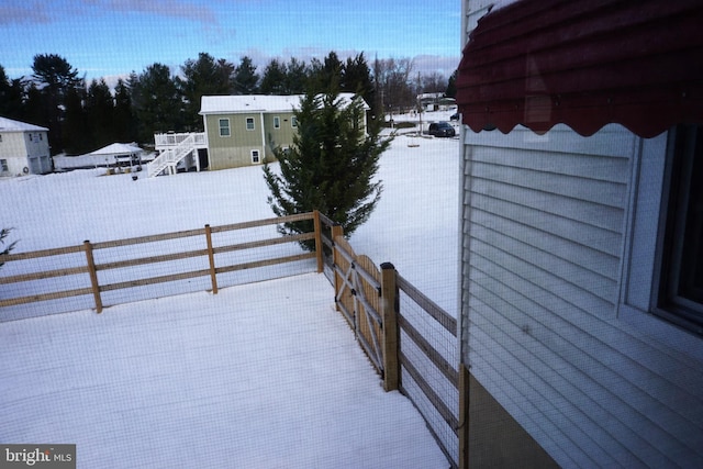 view of yard covered in snow