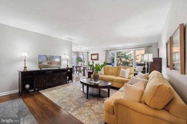 living room featuring dark hardwood / wood-style floors