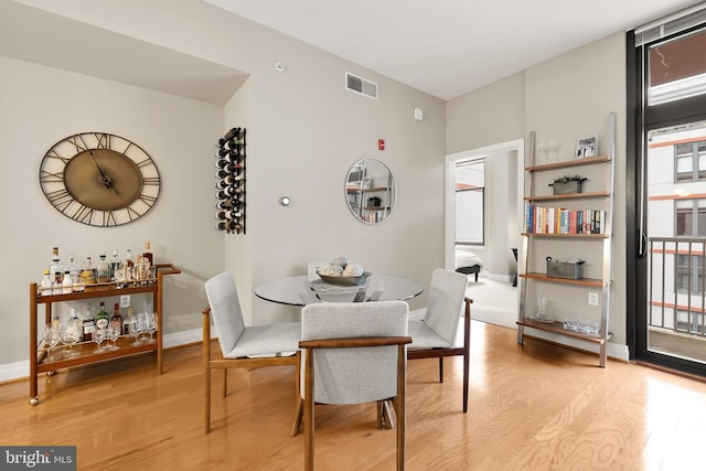 dining room with light hardwood / wood-style flooring