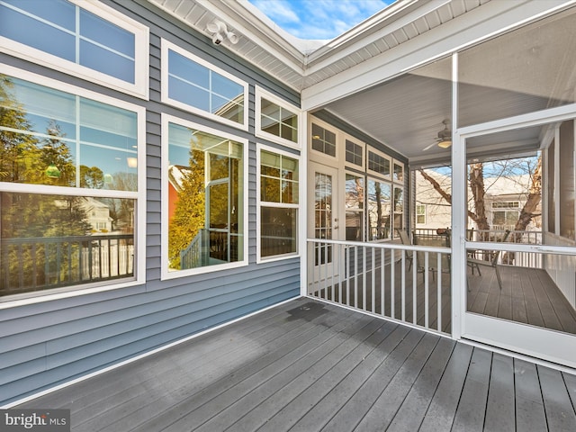 wooden deck with ceiling fan