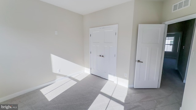 hall with carpet floors