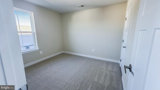 view of carpeted spare room