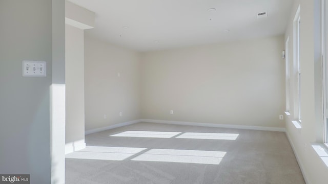 view of carpeted spare room