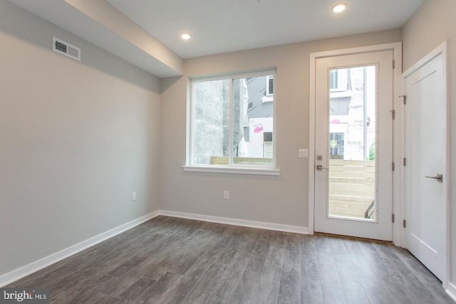 doorway to outside with dark hardwood / wood-style flooring