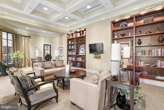 carpeted living room with beamed ceiling, ornamental molding, and coffered ceiling