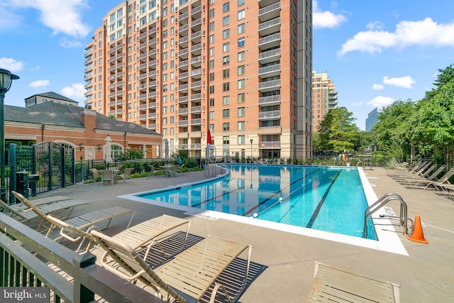 view of swimming pool featuring a patio area