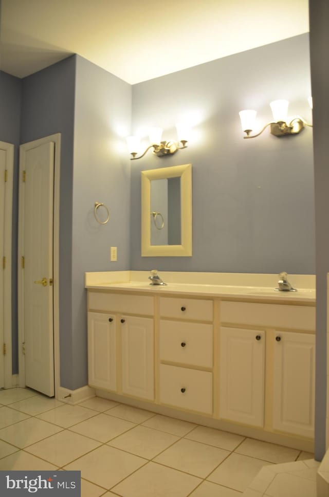 bathroom with vanity and tile patterned floors