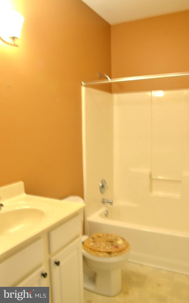 full bathroom featuring vanity, toilet, and shower / tub combination