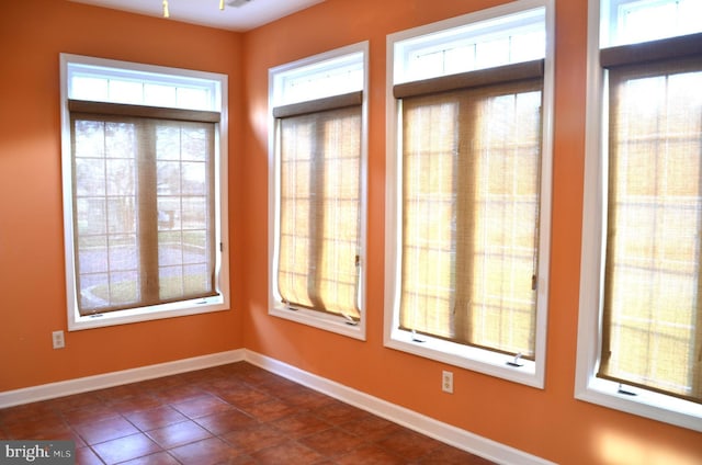 view of tiled spare room