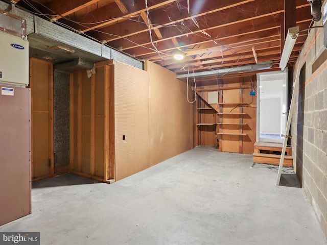 unfinished basement with heating unit