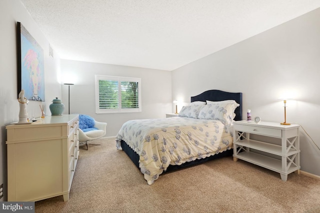 bedroom featuring light carpet