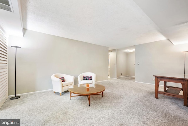 living area with carpet floors