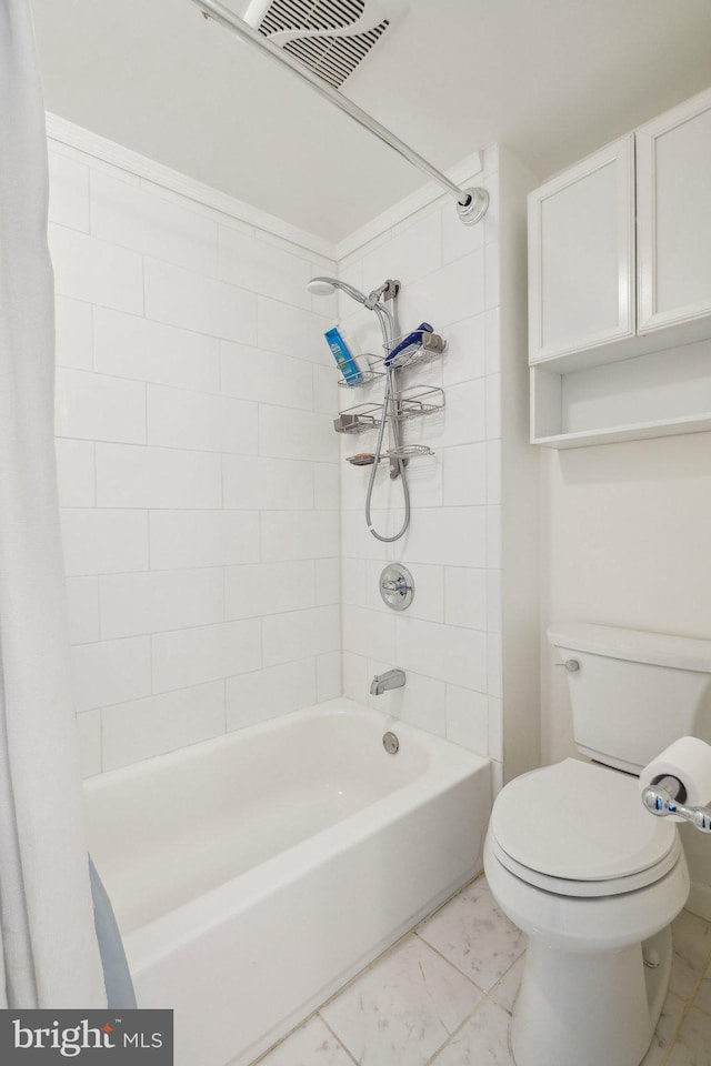 bathroom with toilet and shower / bathtub combination with curtain