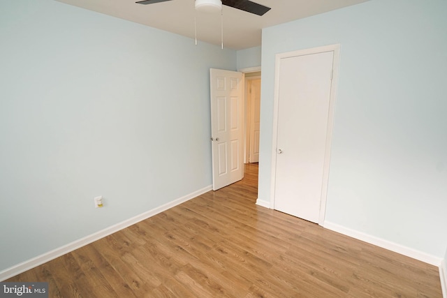 unfurnished room featuring ceiling fan and light hardwood / wood-style floors