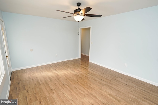 unfurnished room featuring ceiling fan and light hardwood / wood-style floors