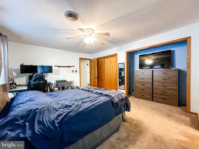 carpeted bedroom featuring ceiling fan