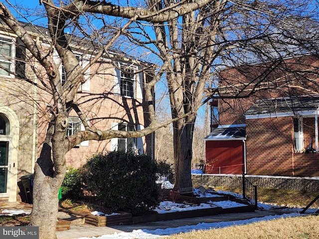 view of snow covered property