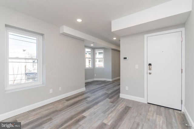 foyer entrance featuring light hardwood / wood-style flooring