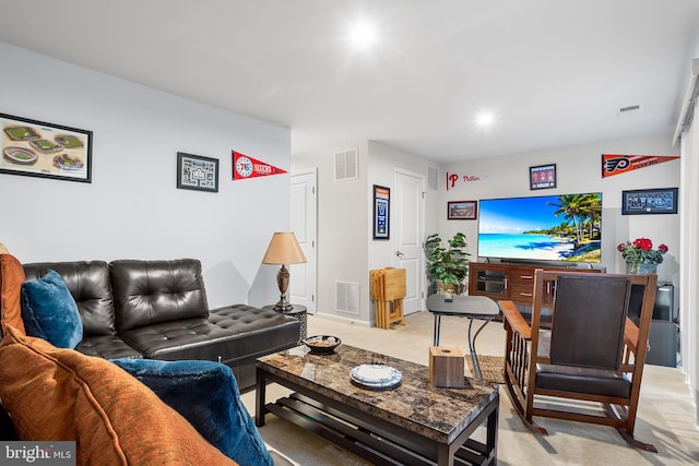 living room featuring light colored carpet