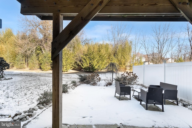 view of yard covered in snow