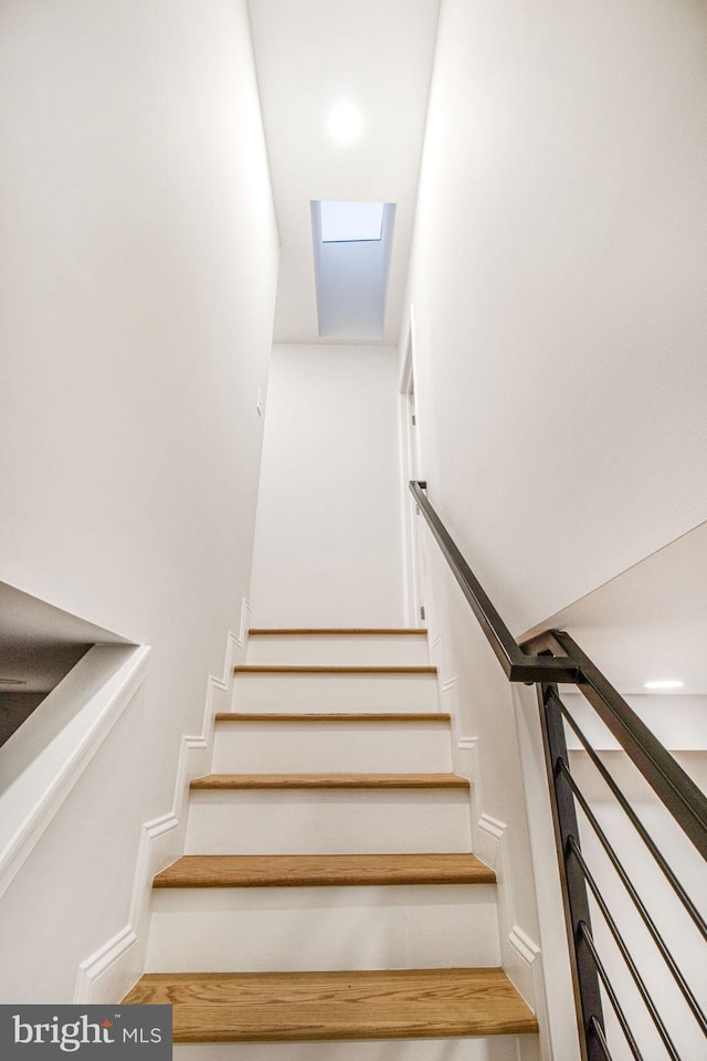 stairway with a skylight