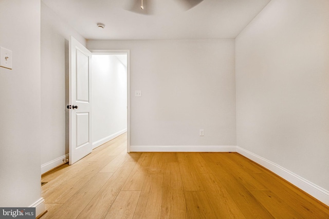 spare room with light hardwood / wood-style floors