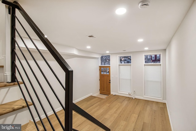 foyer entrance featuring light wood-type flooring