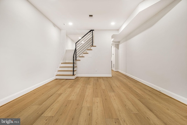 unfurnished living room with light hardwood / wood-style floors