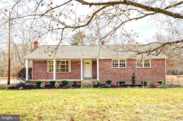 single story home featuring a front yard