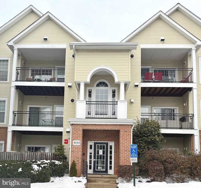 view of snow covered property