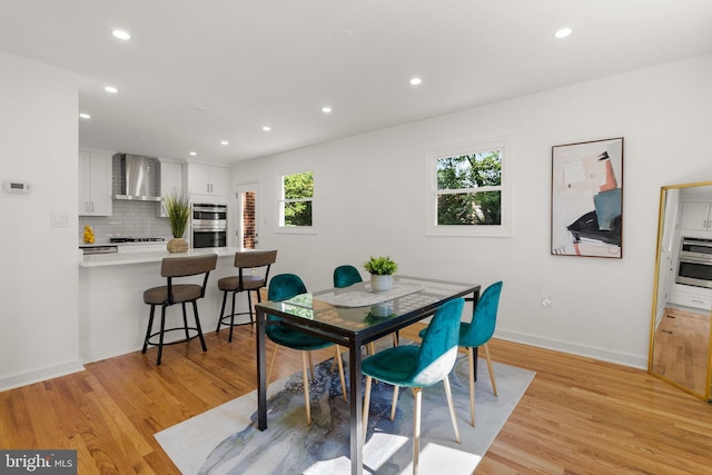 dining area featuring light hardwood / wood-style flooring