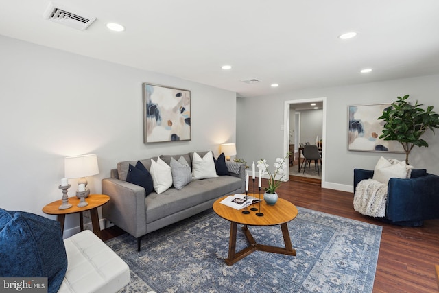 living room featuring dark hardwood / wood-style floors