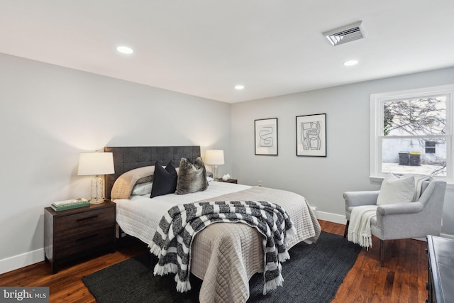 bedroom featuring dark wood-type flooring