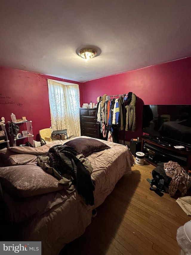 bedroom featuring hardwood / wood-style floors