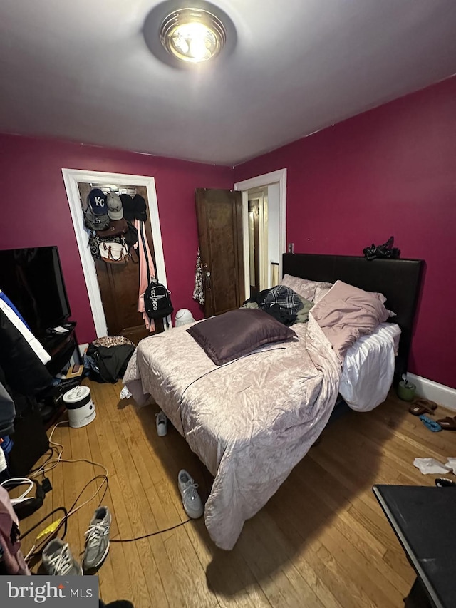 bedroom featuring hardwood / wood-style flooring