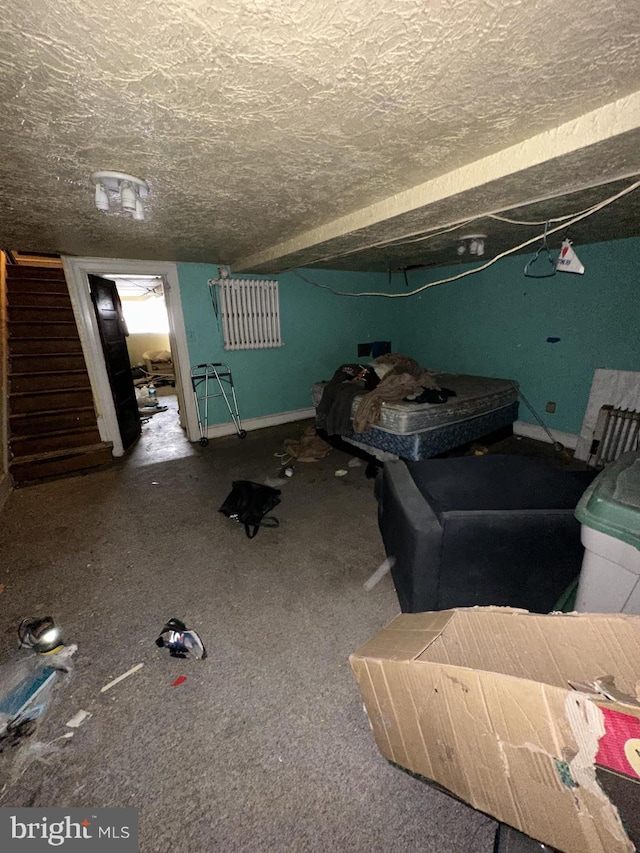 unfurnished bedroom featuring a textured ceiling