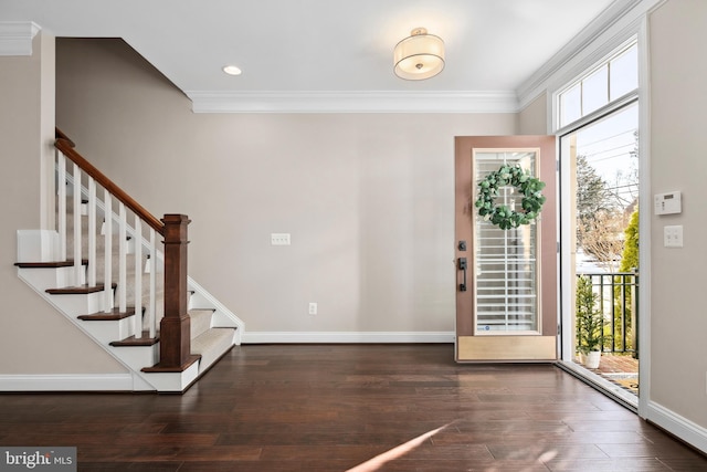 entrance foyer featuring crown molding and dark hardwood / wood-style floors