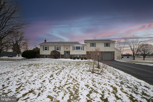 view of front of property with a garage