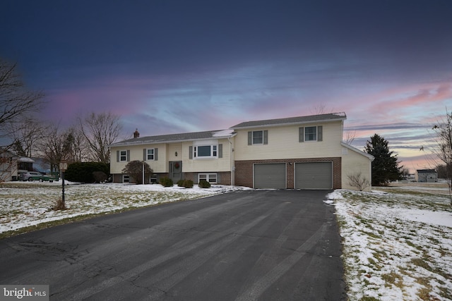 view of front of property with a garage