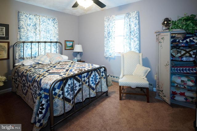 carpeted bedroom featuring ceiling fan and a baseboard heating unit