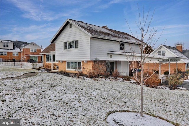 view of snow covered property