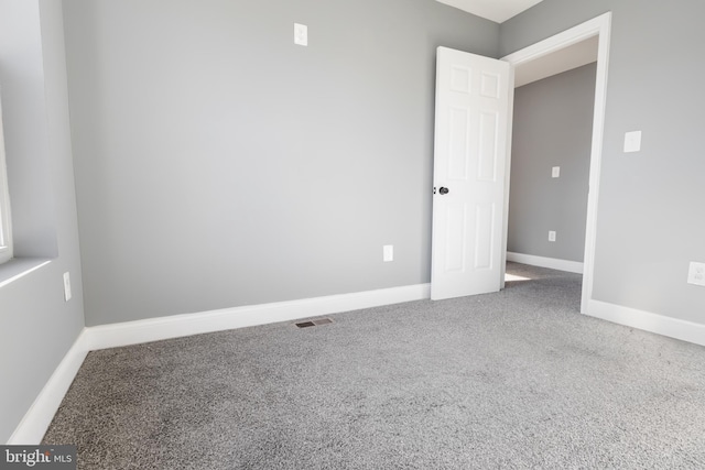 view of carpeted spare room