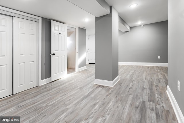 basement with light wood-type flooring