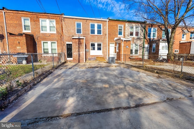 view of property featuring central AC unit