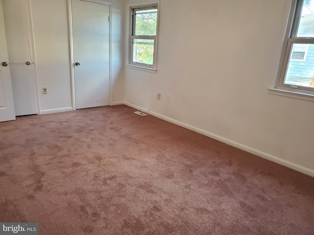 unfurnished bedroom featuring carpet floors